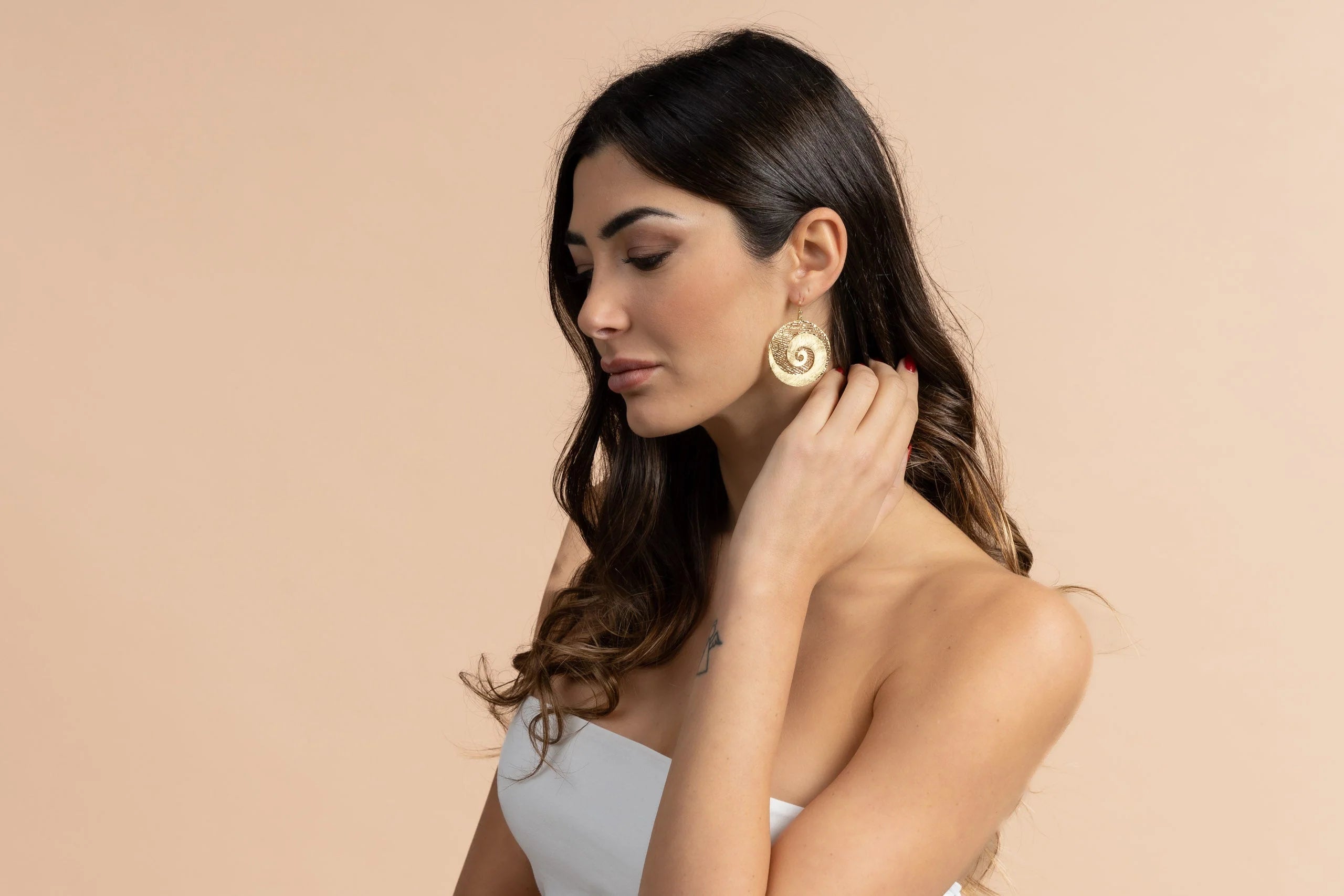 Orecchini tondi spirale in Ottone