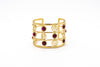 Bracciale ottone fascia riccioli e pietre Rubino